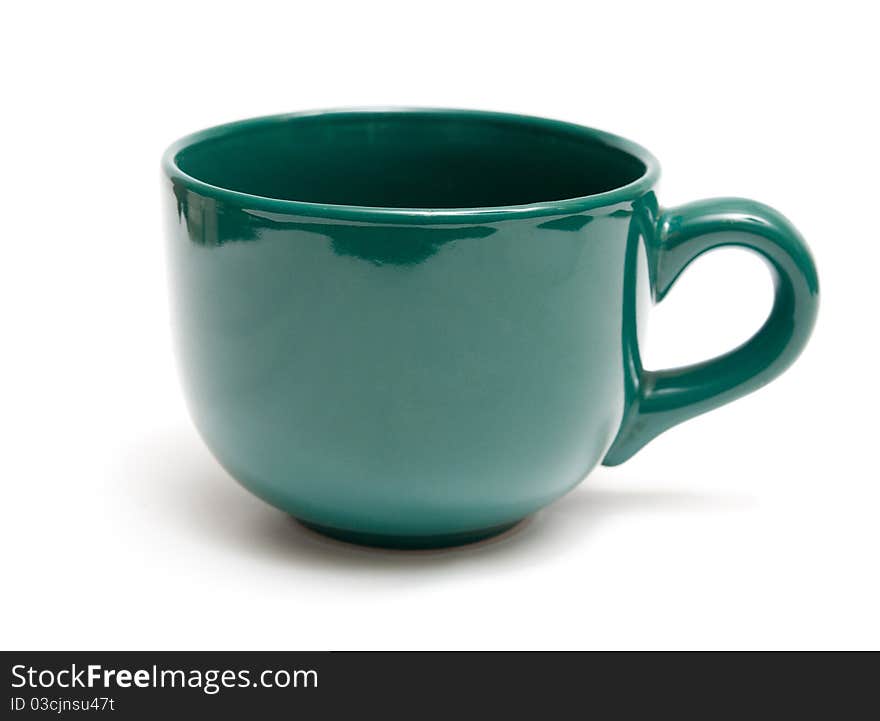 Green mug isolated on a white background