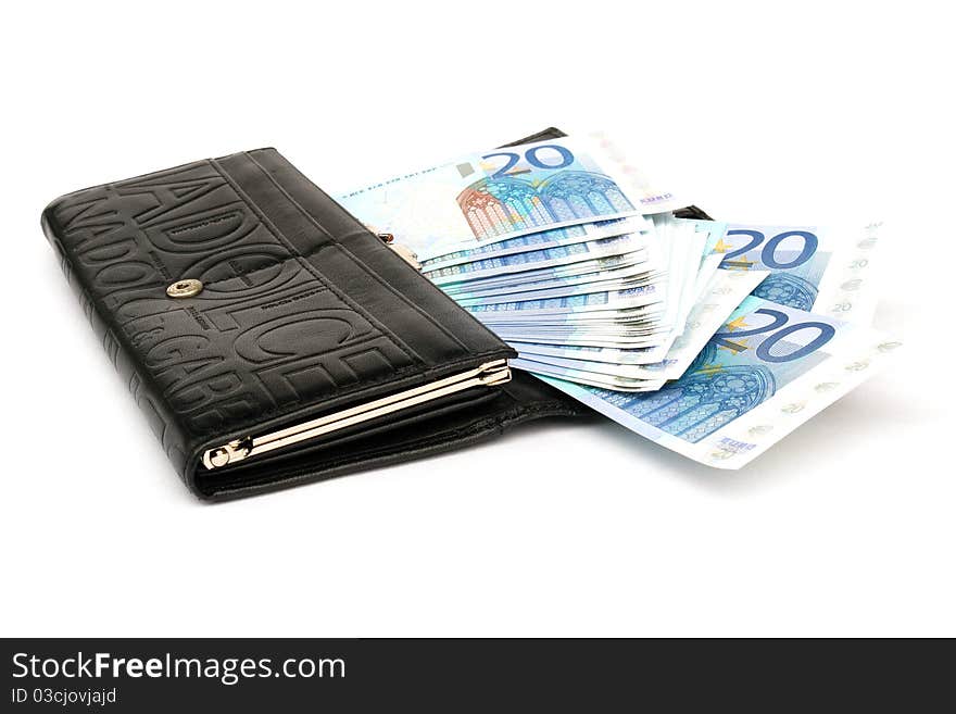 Money in a purse on a white background