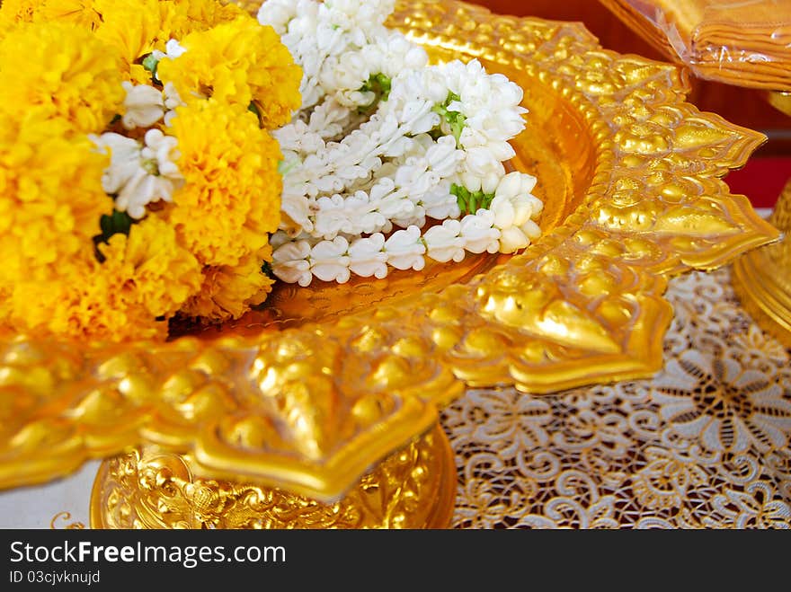 Jasmine garland on gold plate for the worship ceremony