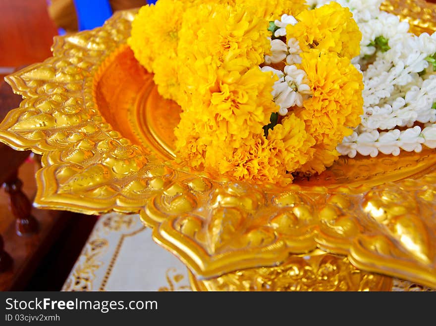 Jasmine garland on gold plate for the worship ceremony