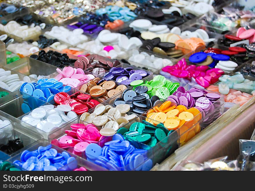 Vintage clothes buttons with variety color on sell in market. Vintage clothes buttons with variety color on sell in market