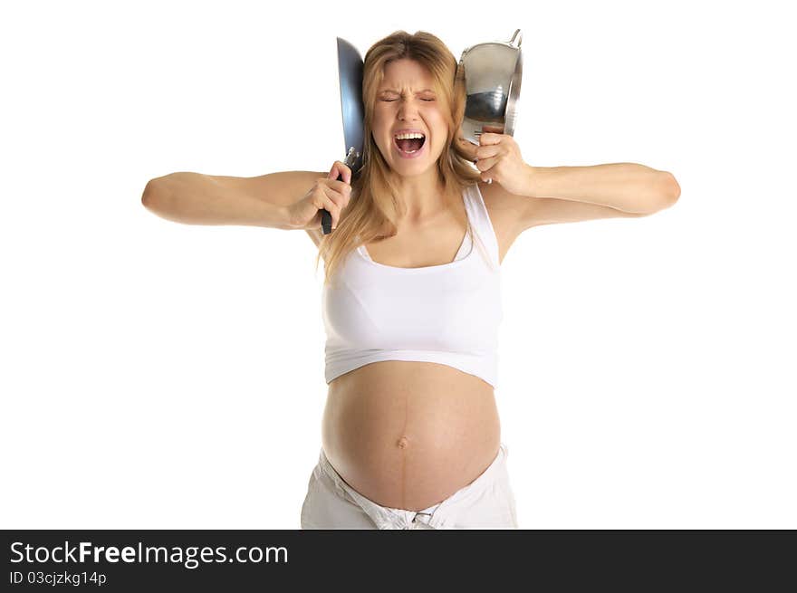 Dissatisfied with the pregnant woman with cooking utensils isolated on white