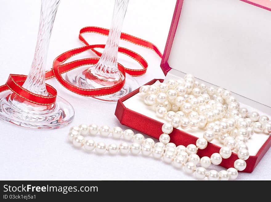 Pearls in a red box