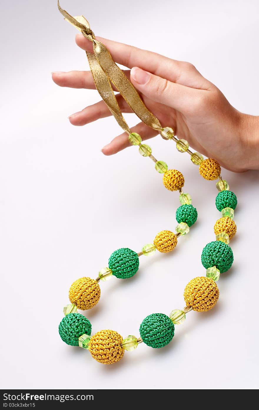 Necklace of beads knitted