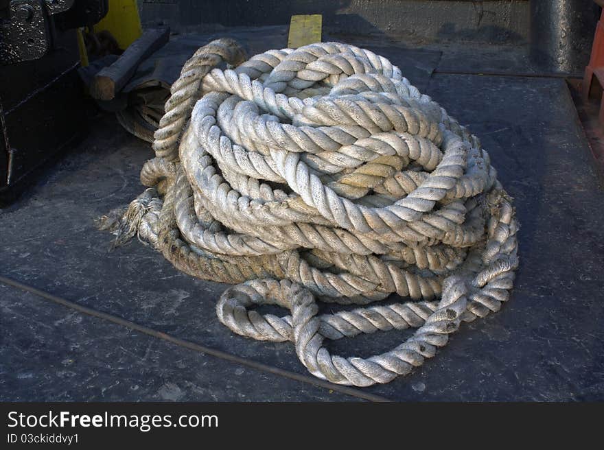 A heavy rope tangled on a ship. A heavy rope tangled on a ship.