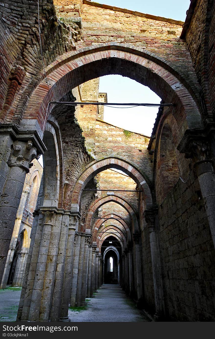 Archway of the unfinished Abbey of San Galagano in Tuscany at sunset. Archway of the unfinished Abbey of San Galagano in Tuscany at sunset