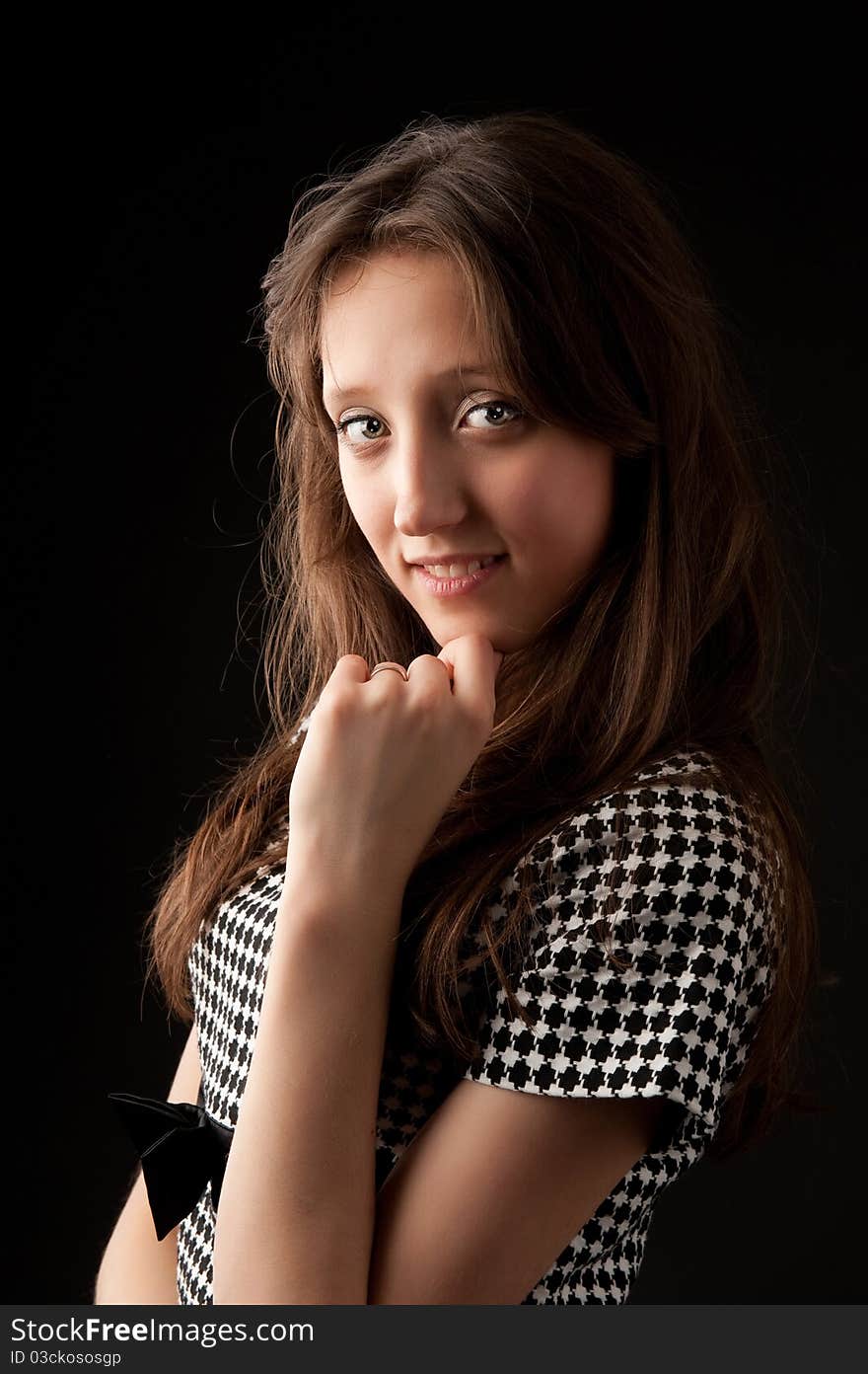 Portrait of a beautiful young woman looking happy