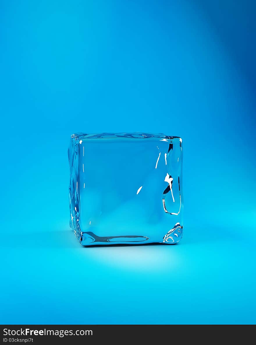 Ice cube on blue background