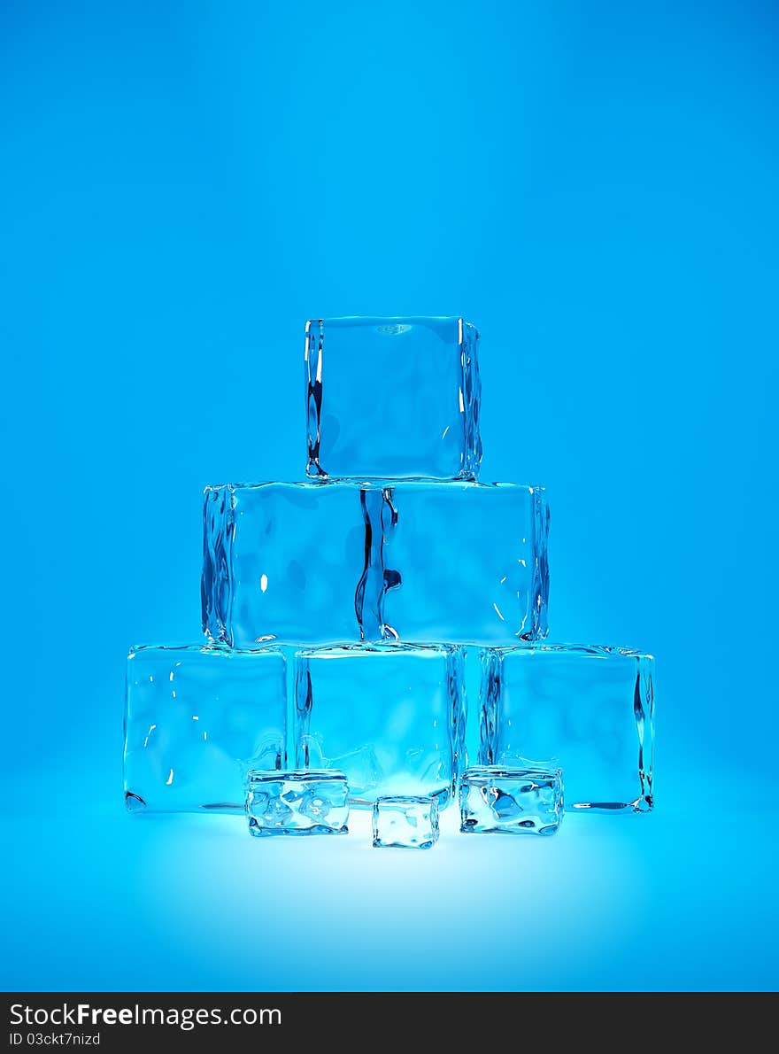 Ice cubes on cyan background