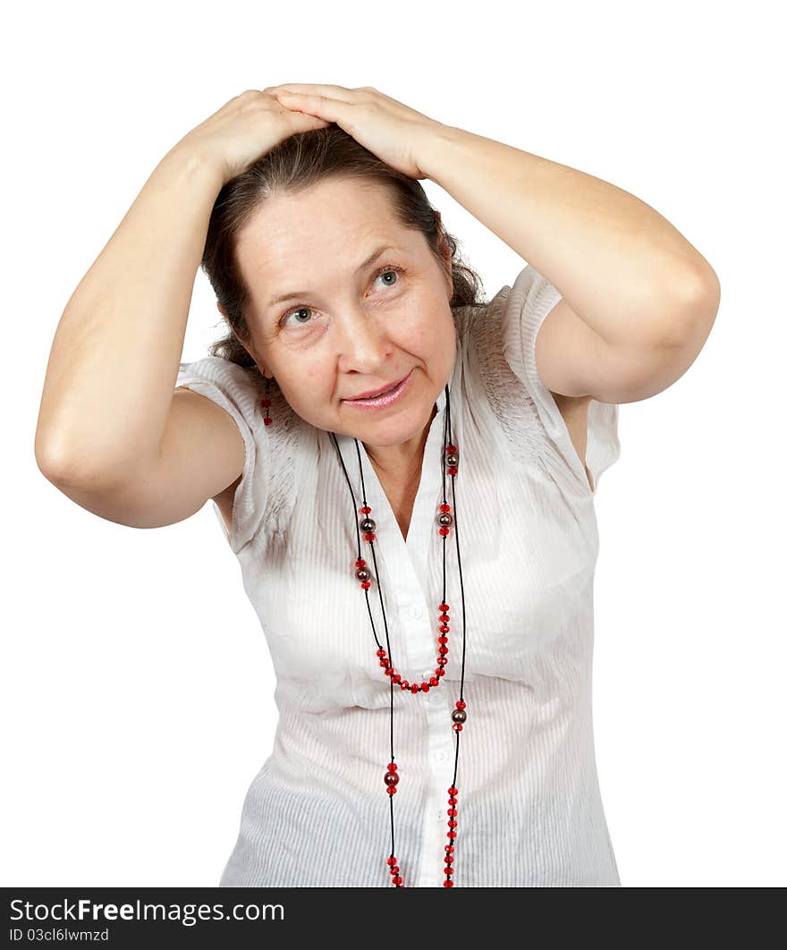 Mature woman is apparently scared and trying to cover her head. Mature woman is apparently scared and trying to cover her head