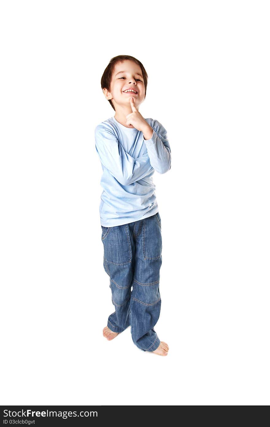 Full length portrait of joyful smiling little boy in jeans on white background. Full length portrait of joyful smiling little boy in jeans on white background