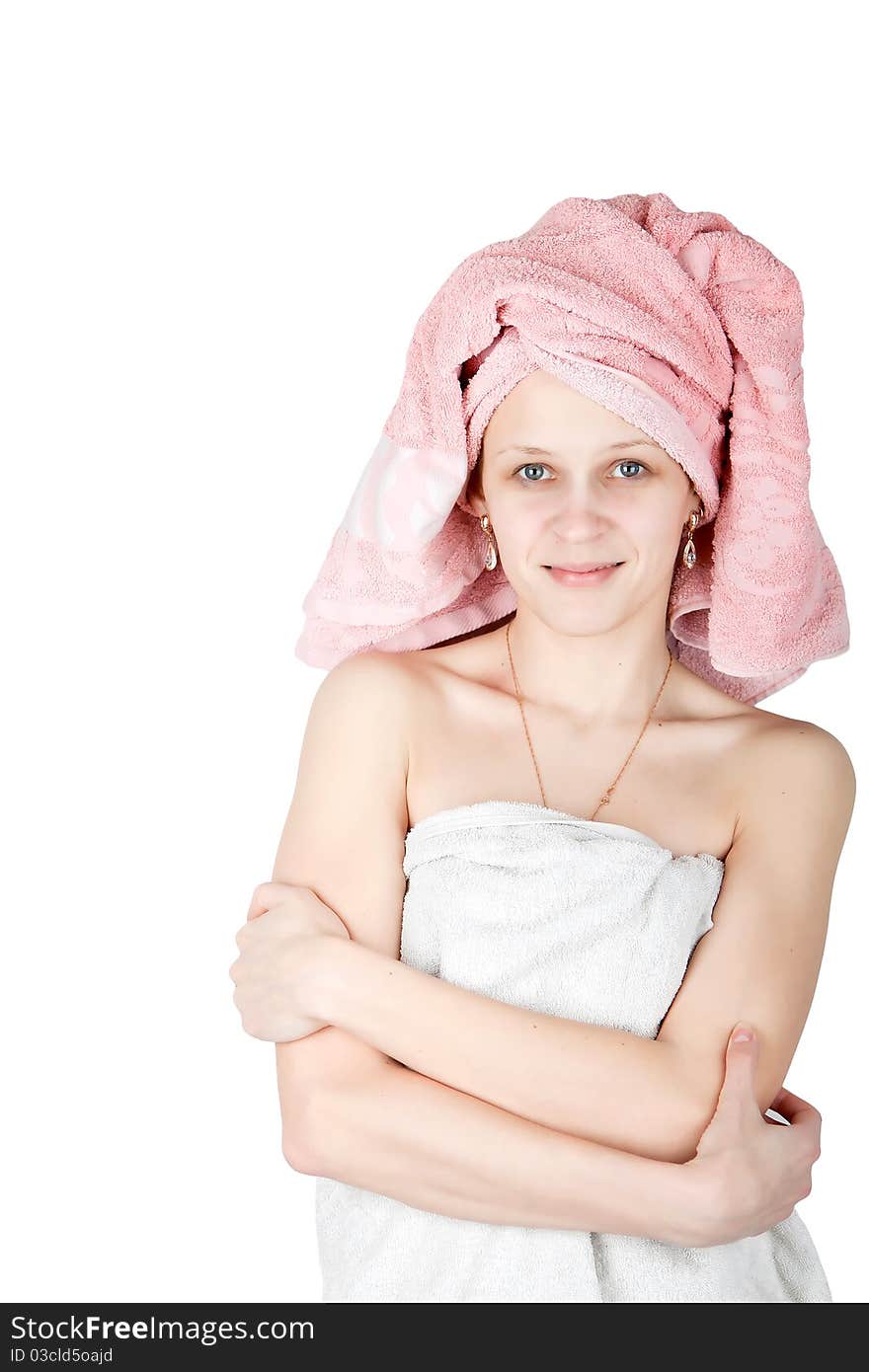 Portrait of woman wrapped towel isolated