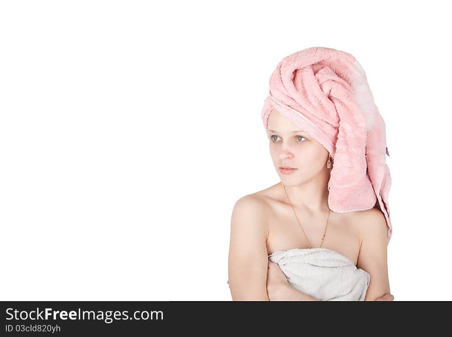 Portrait of woman wrapped towel isolated