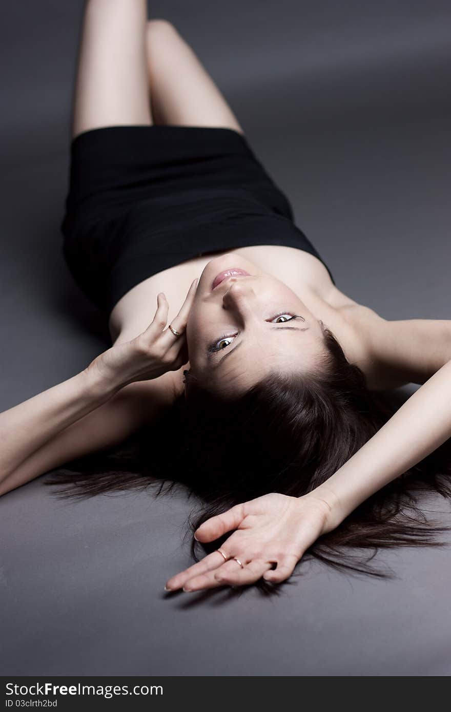 Portrait of a beautiful girl on a dark background