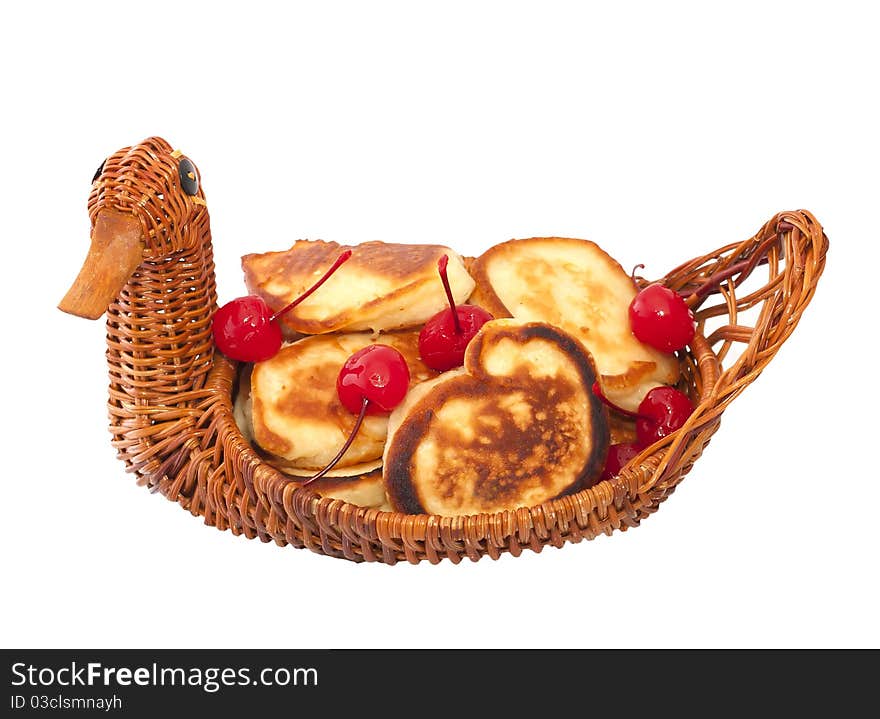 Fried donuts in a wicker basket