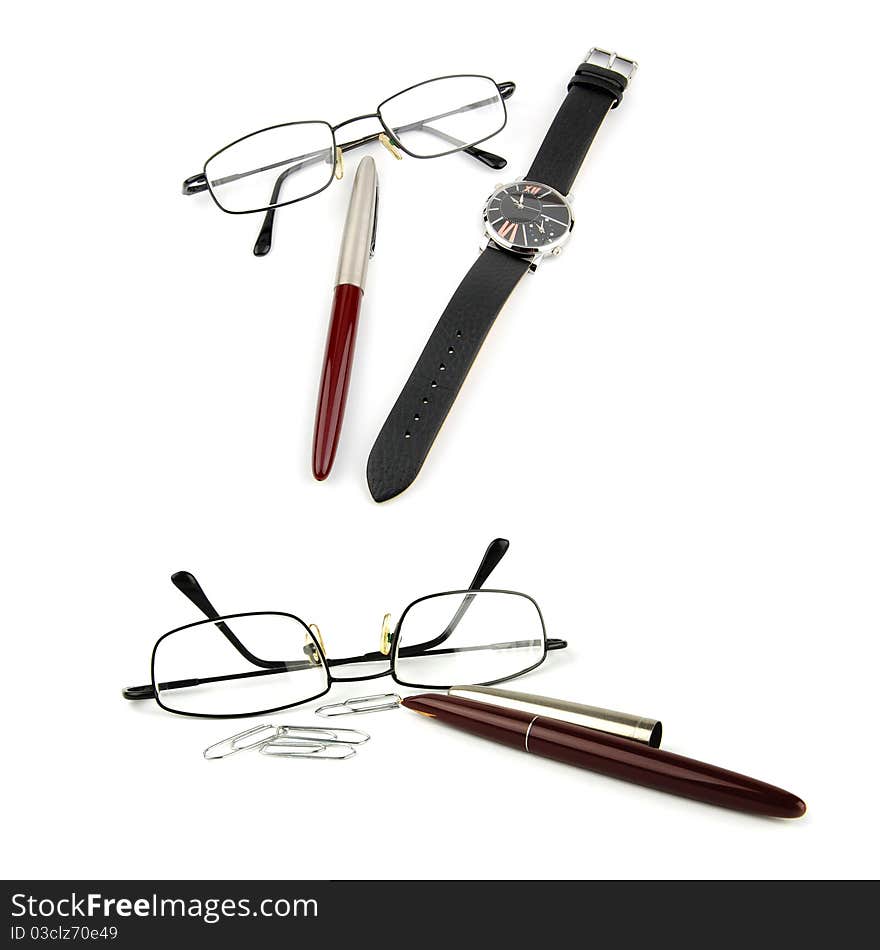 Glasses, pen, watch and paper-clip.