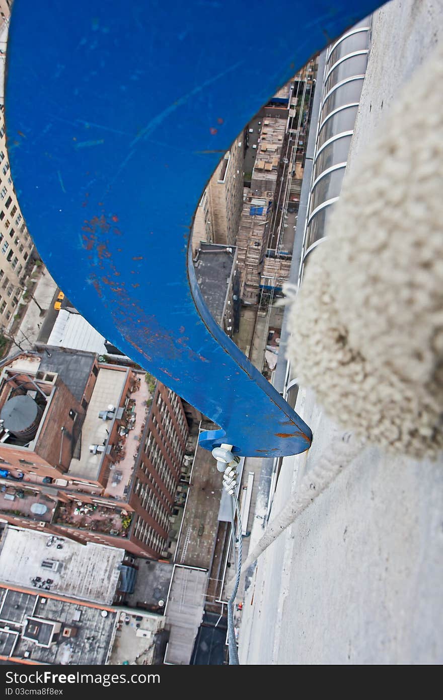 Cornice Hook hanging on the parapet wall.