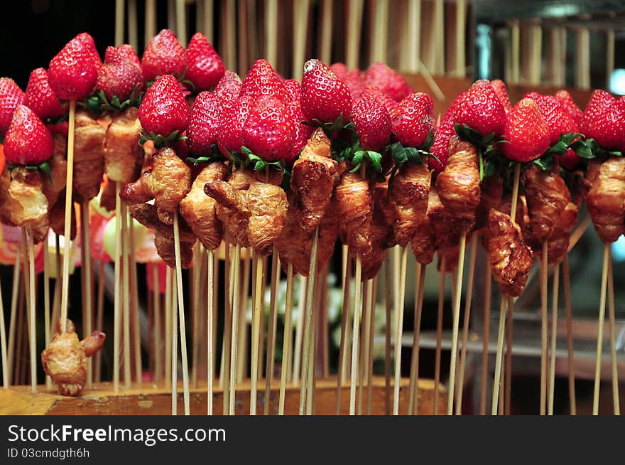 Fresh and delicious strawberries on sticks