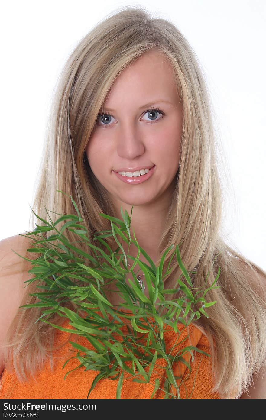 Beautiful Young Woman With Green Leaves