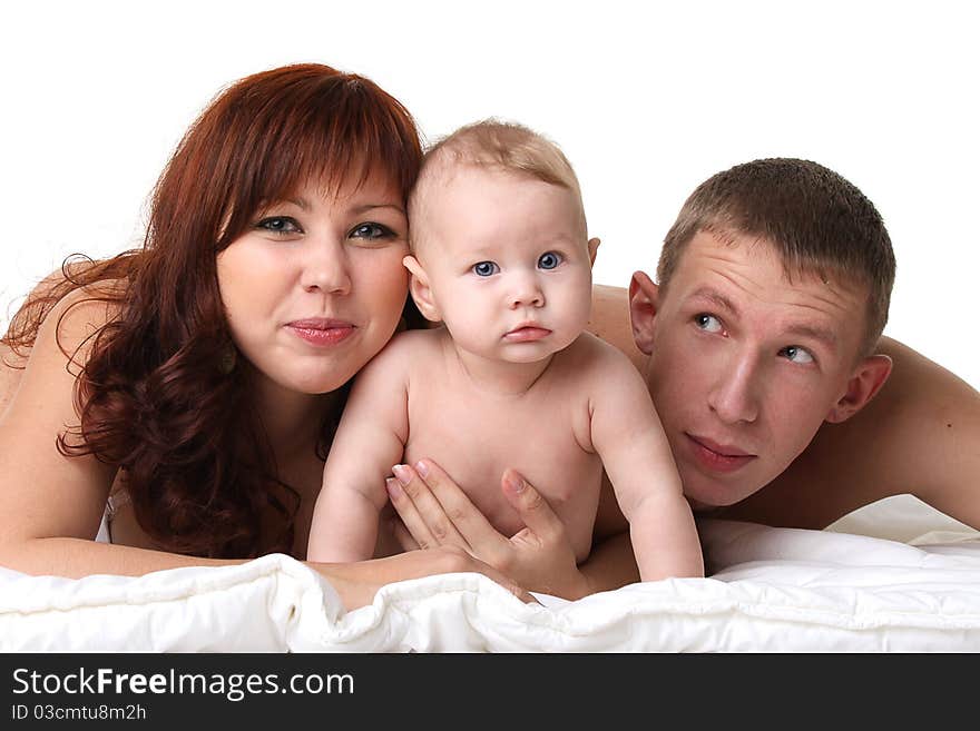 Young smiling family on white background