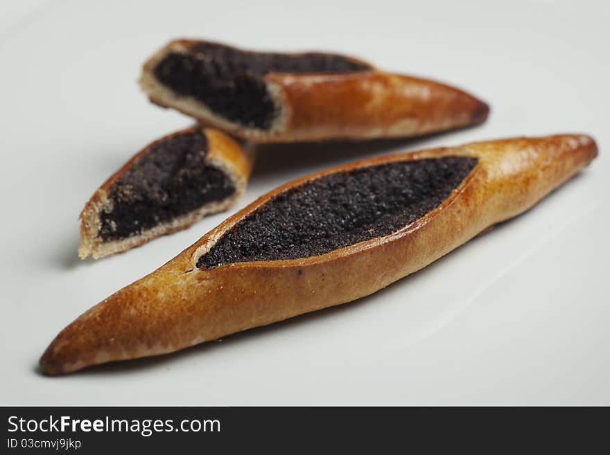 Freshly baked home made pastry filled with poppy seeds. Freshly baked home made pastry filled with poppy seeds