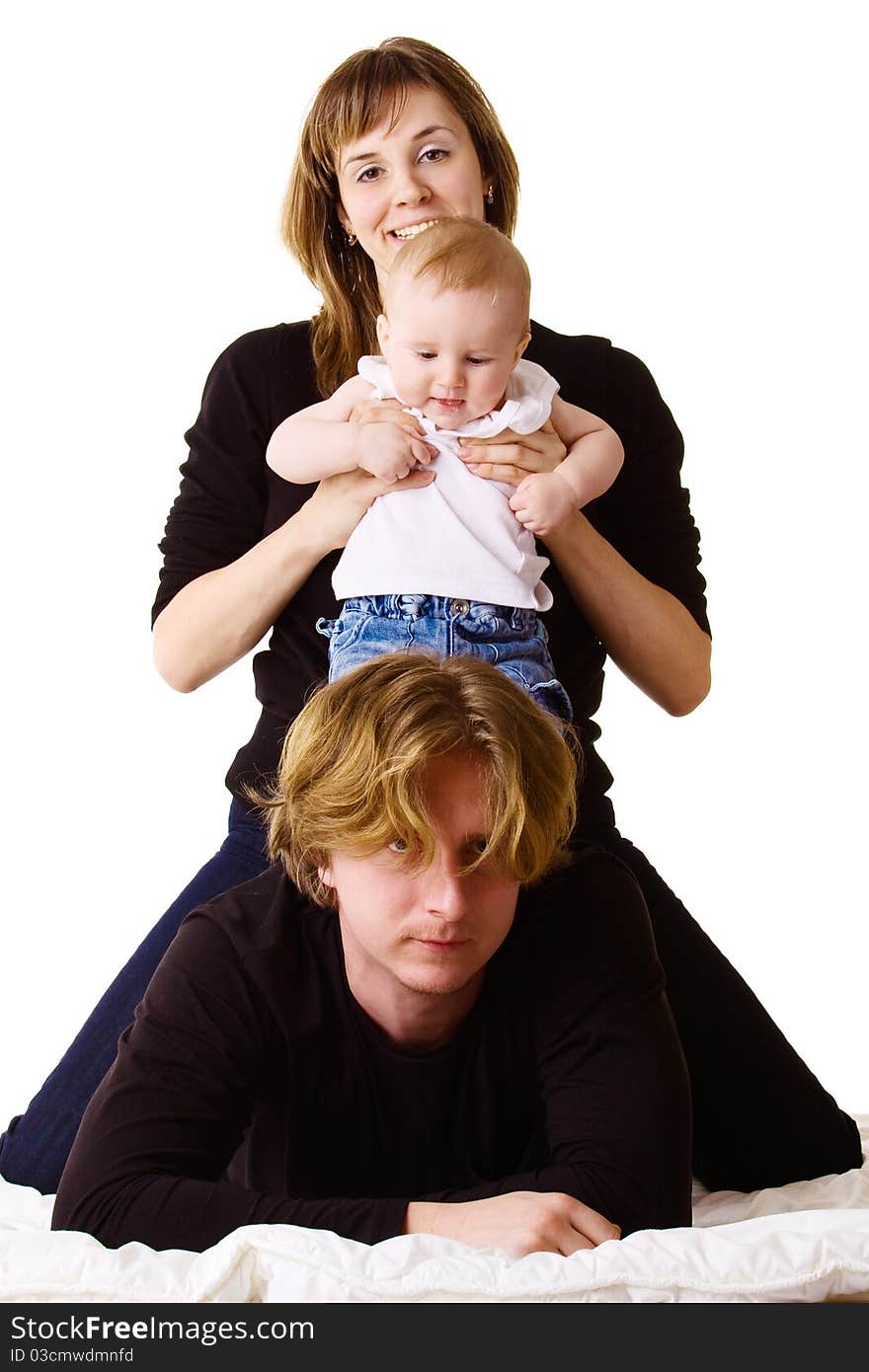 Young smiling family with baby boy isolated on white. Young smiling family with baby boy isolated on white