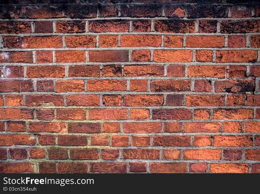 Red brick wall with no markings, ready for graffiti. Red brick wall with no markings, ready for graffiti