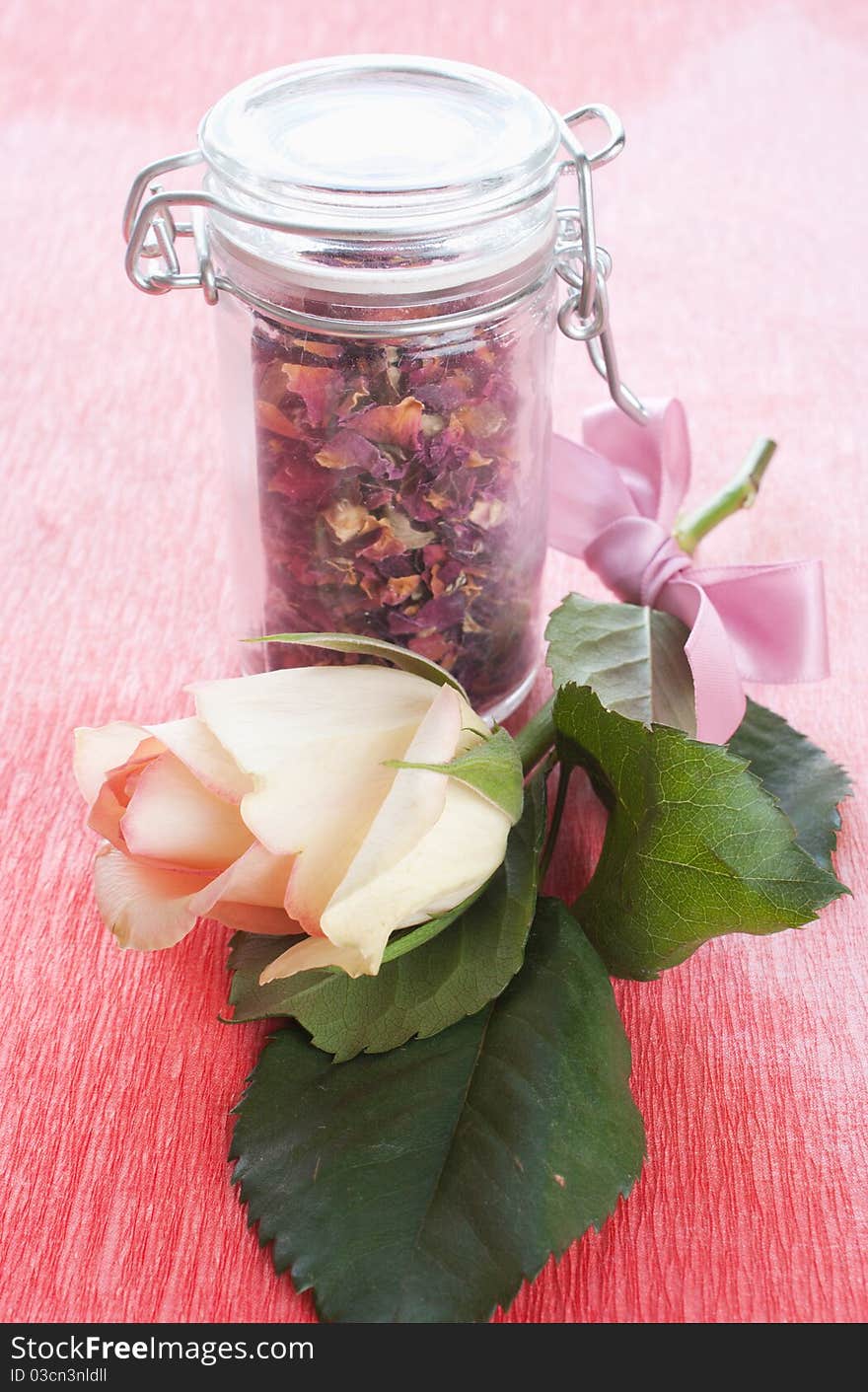 Dried rose petals in a jar