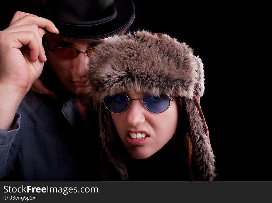 young couple. Posing in a studio. young couple. Posing in a studio