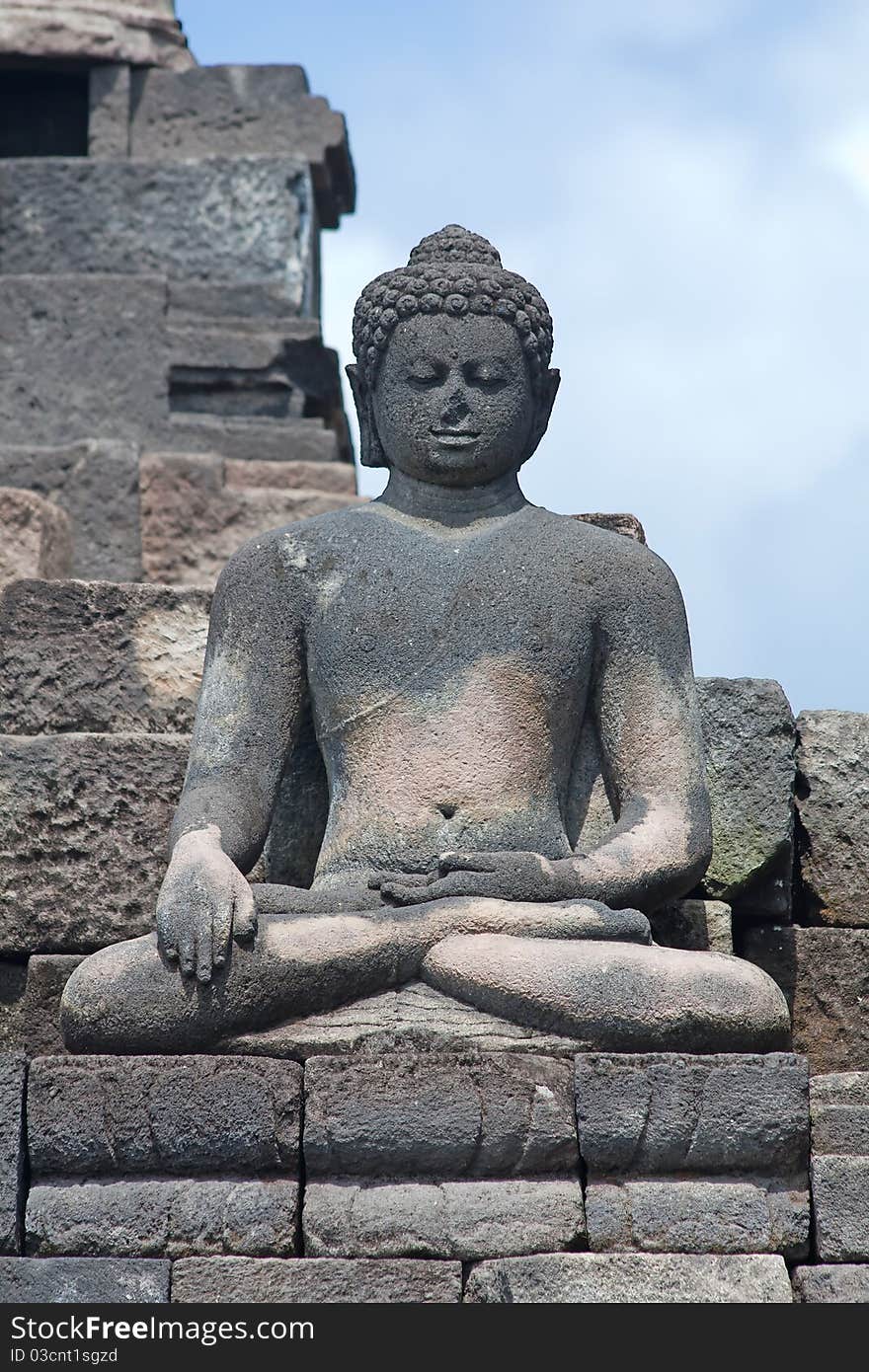 Buddha statue in Borobudur temple near Yogyakarta on Java island, Indonesia. Buddha statue in Borobudur temple near Yogyakarta on Java island, Indonesia