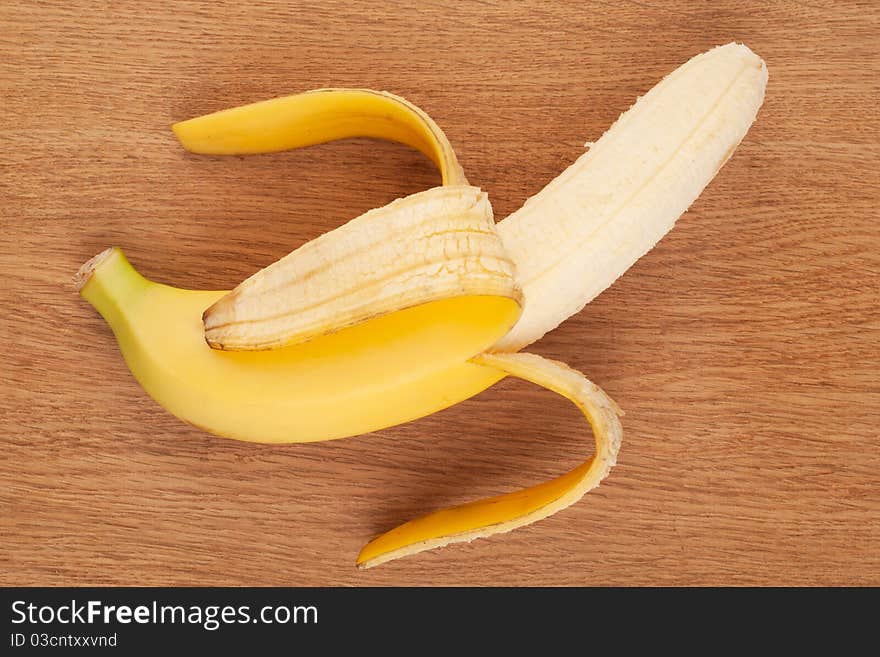 Ripe banana on a wooden background