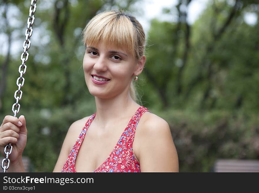 Portrait of a beautiful woman smiling outdoors