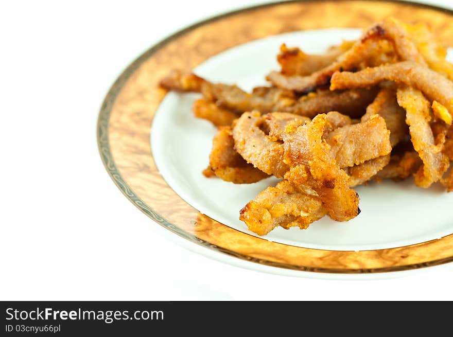 Fried pork isolated on white