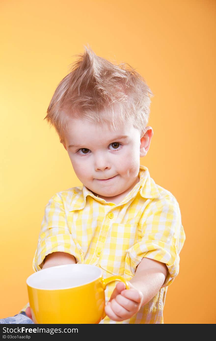 Little boy show empty cup