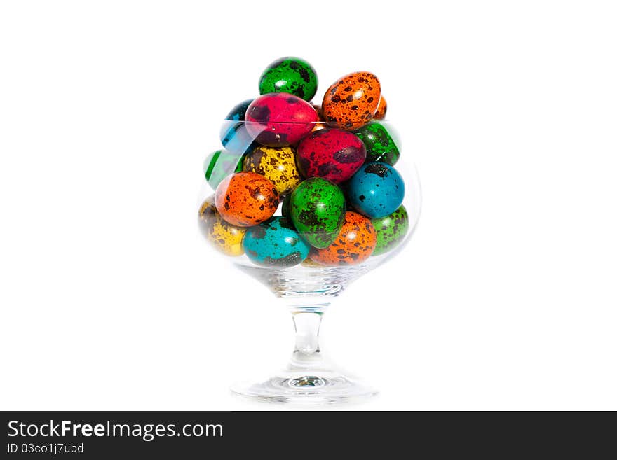 Easter colorful eggs in glass, closeup portrait