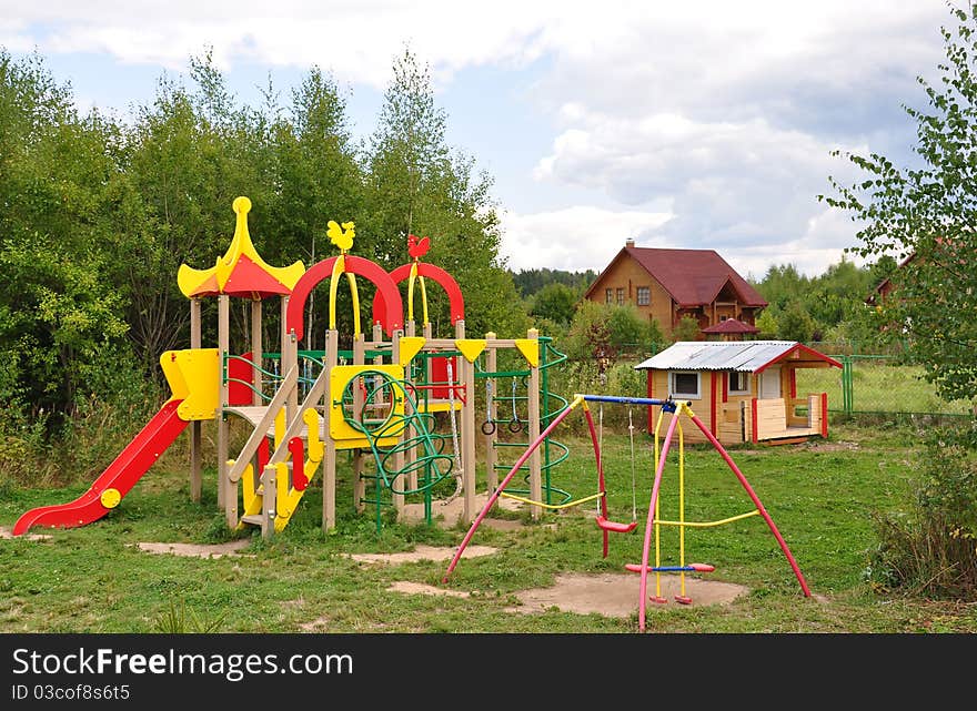 Children's Playground of plastic in the cottage. Russia. Children's Playground of plastic in the cottage. Russia.