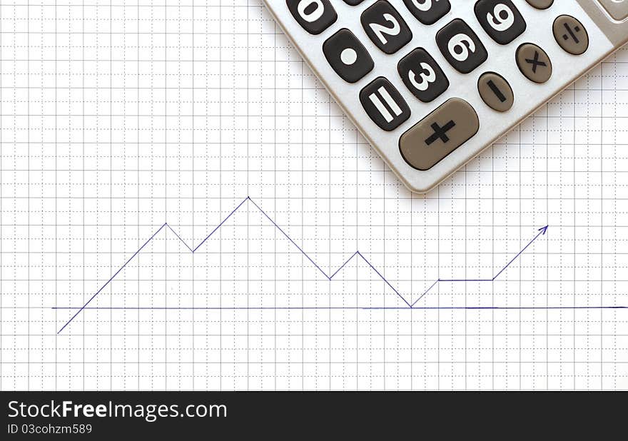 Calculator and the working paper with a diagram