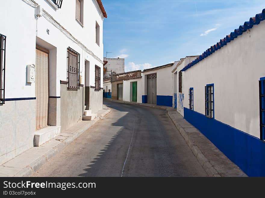 Street with white houses in small village in spain. Street with white houses in small village in spain