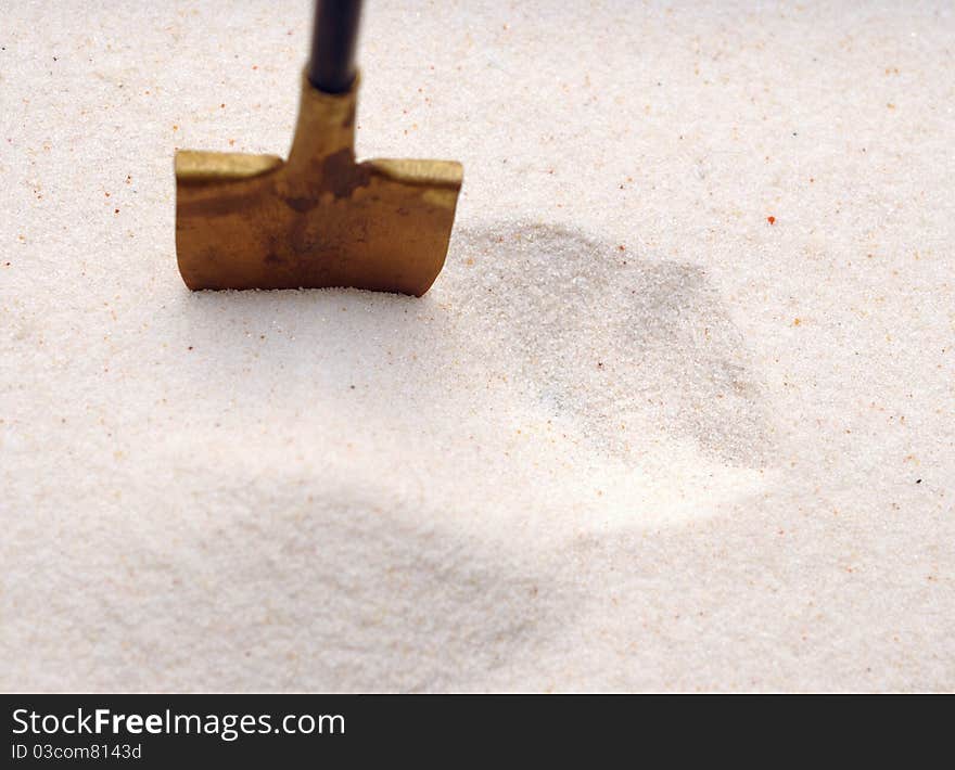 Shovel In A Sand