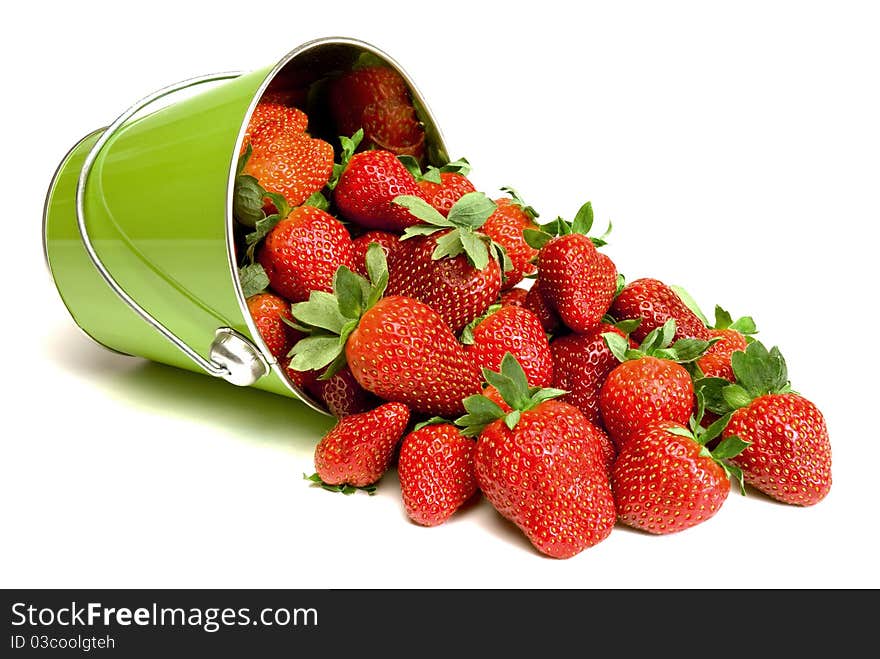 Fresh Strawberries Pouring Out Of Pail