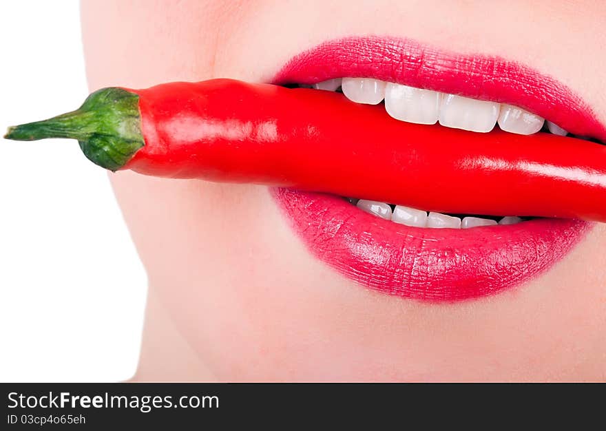 A Red Pepper Between The Teeth