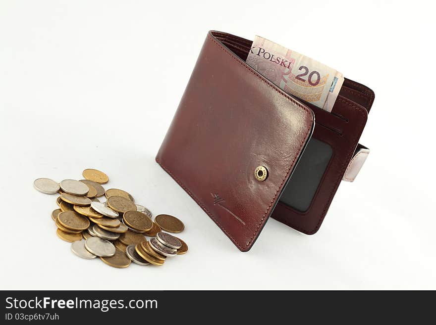 Brown skin wallet and coins isolated on white background. Brown skin wallet and coins isolated on white background.