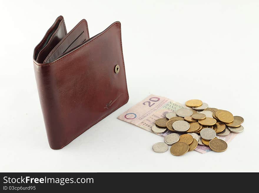 Brown skin wallet and coins isolated on white background. Brown skin wallet and coins isolated on white background.