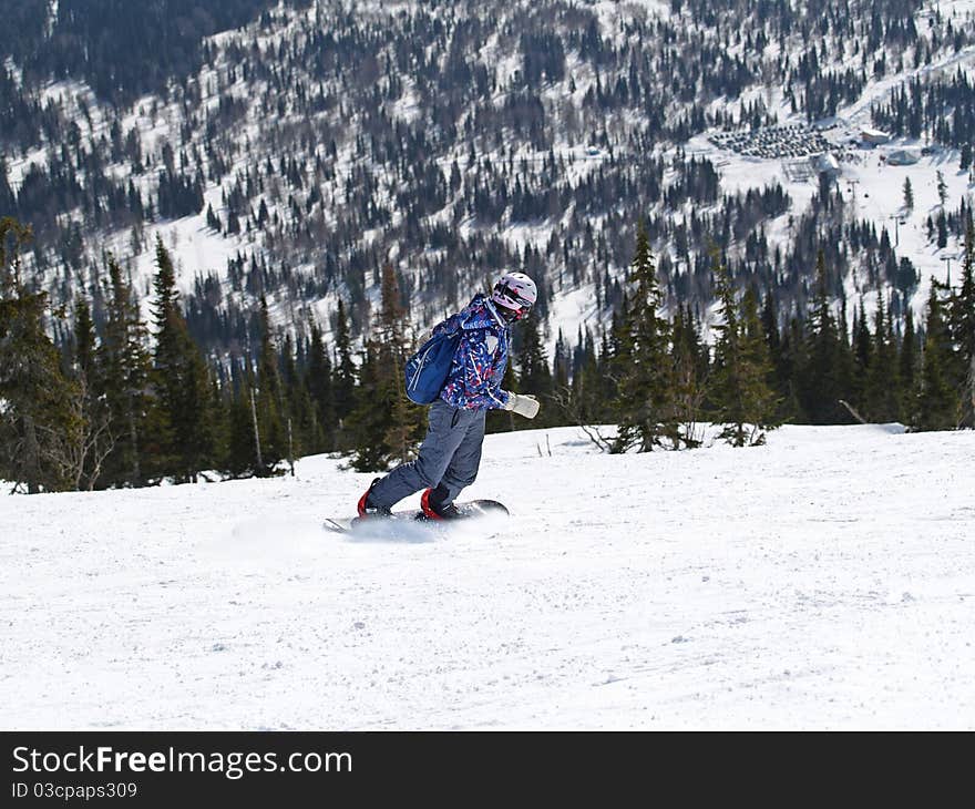 Snowboarder in the mountains Shoria