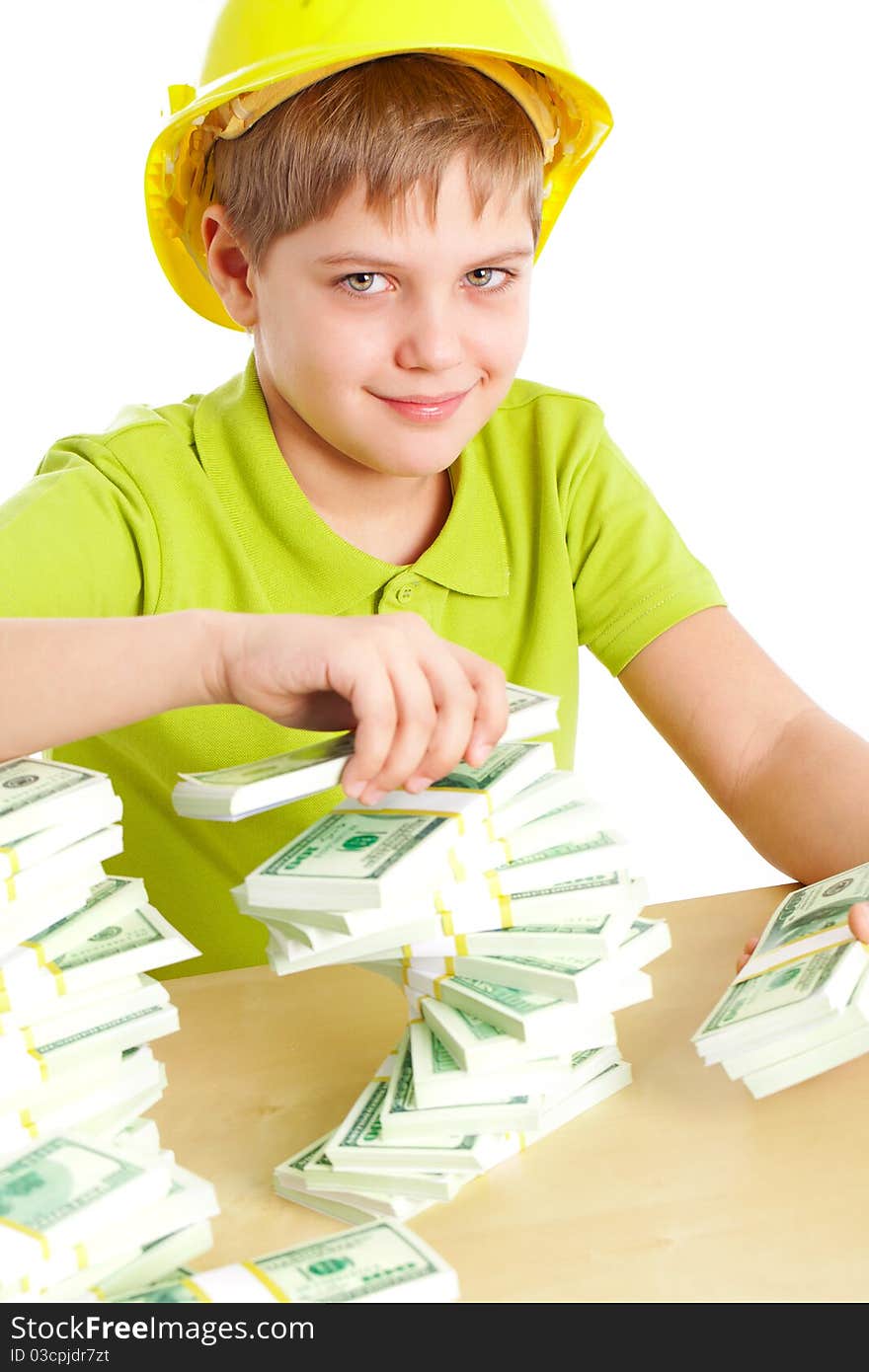 Young businessman with dollars on the table