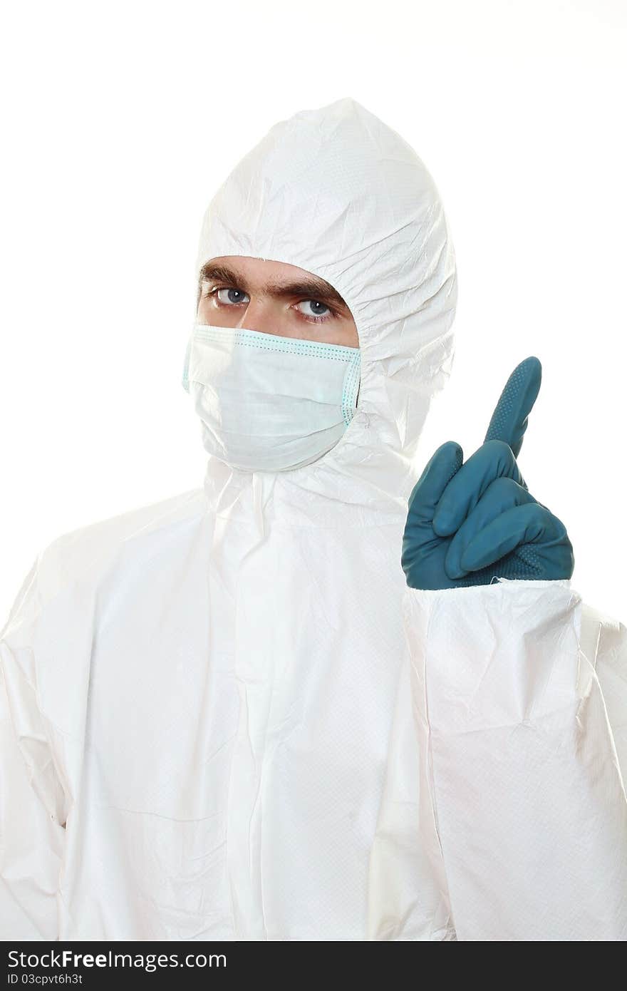 Man in protective suit, a mask and a respirator. Holds a sign with a skull. Isolated on white