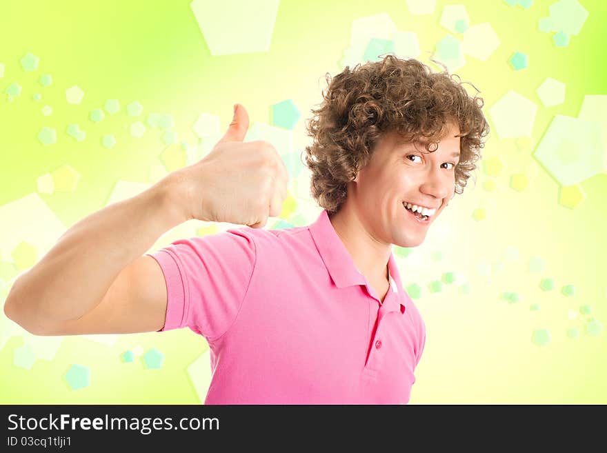 Happy curly man on yellow background