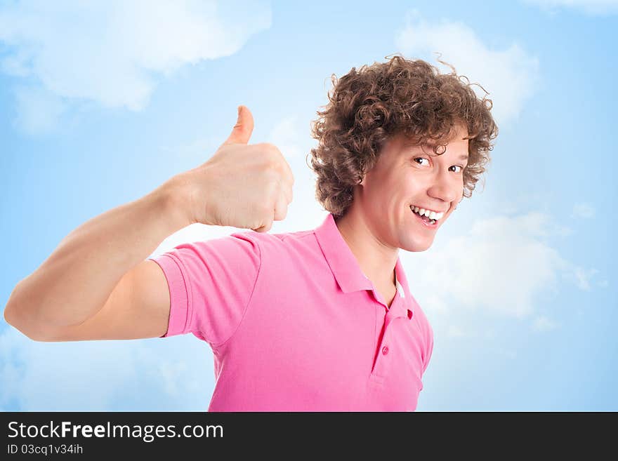 Happy curly man on yellow background