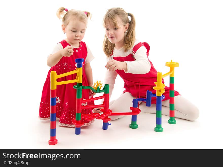 Girls play,on white background.