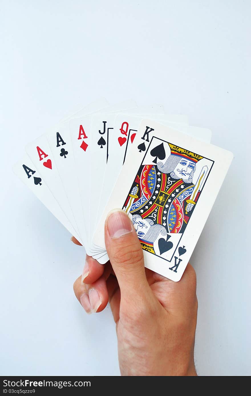 Hand is holding the card for playing